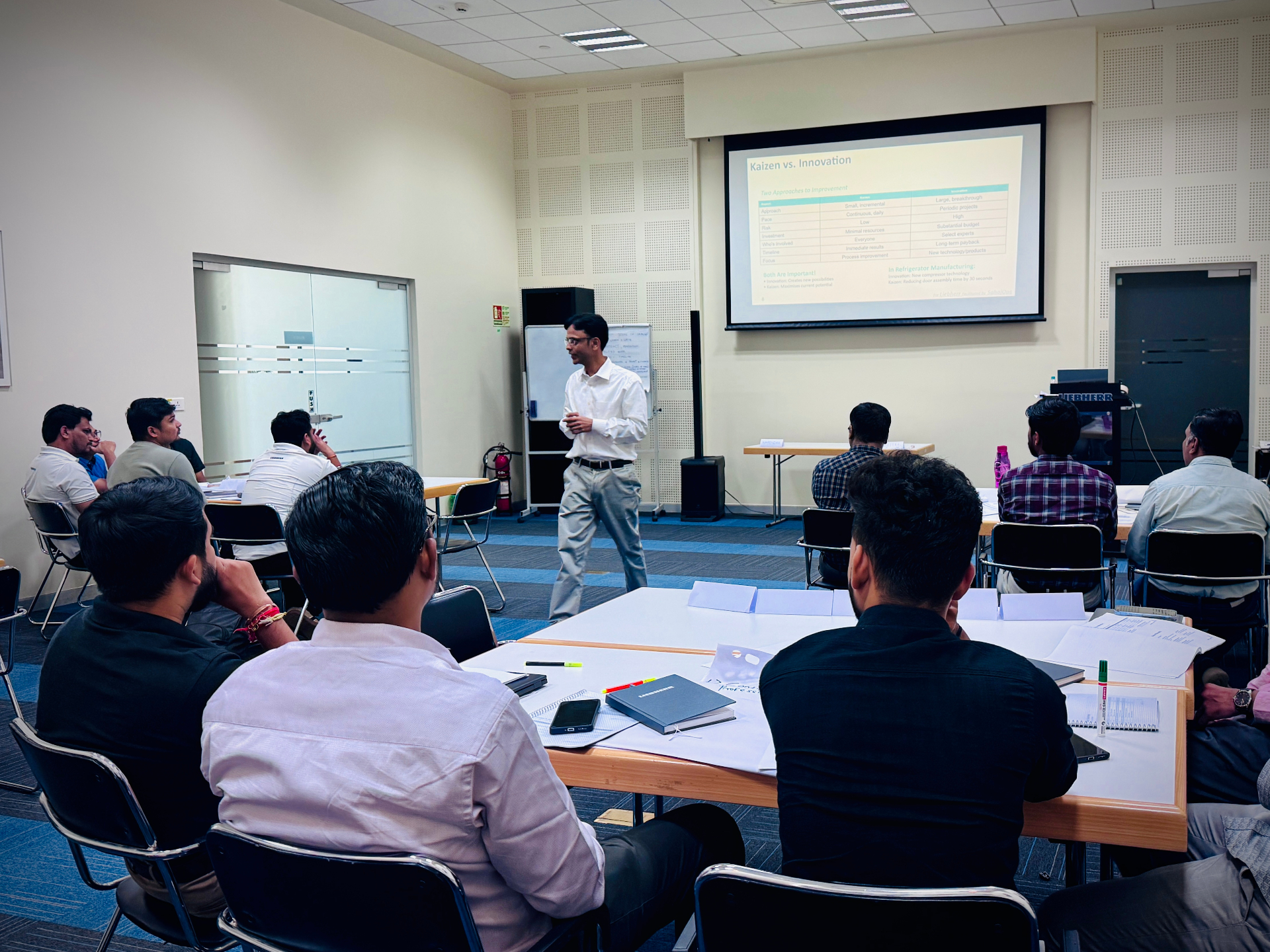 SahajOps workshop session with participants in a training room