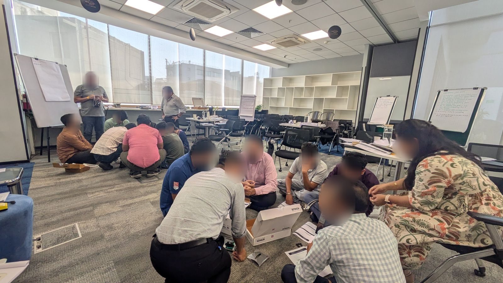Teardown and DFM exercise on the floor, design engineering workshop
