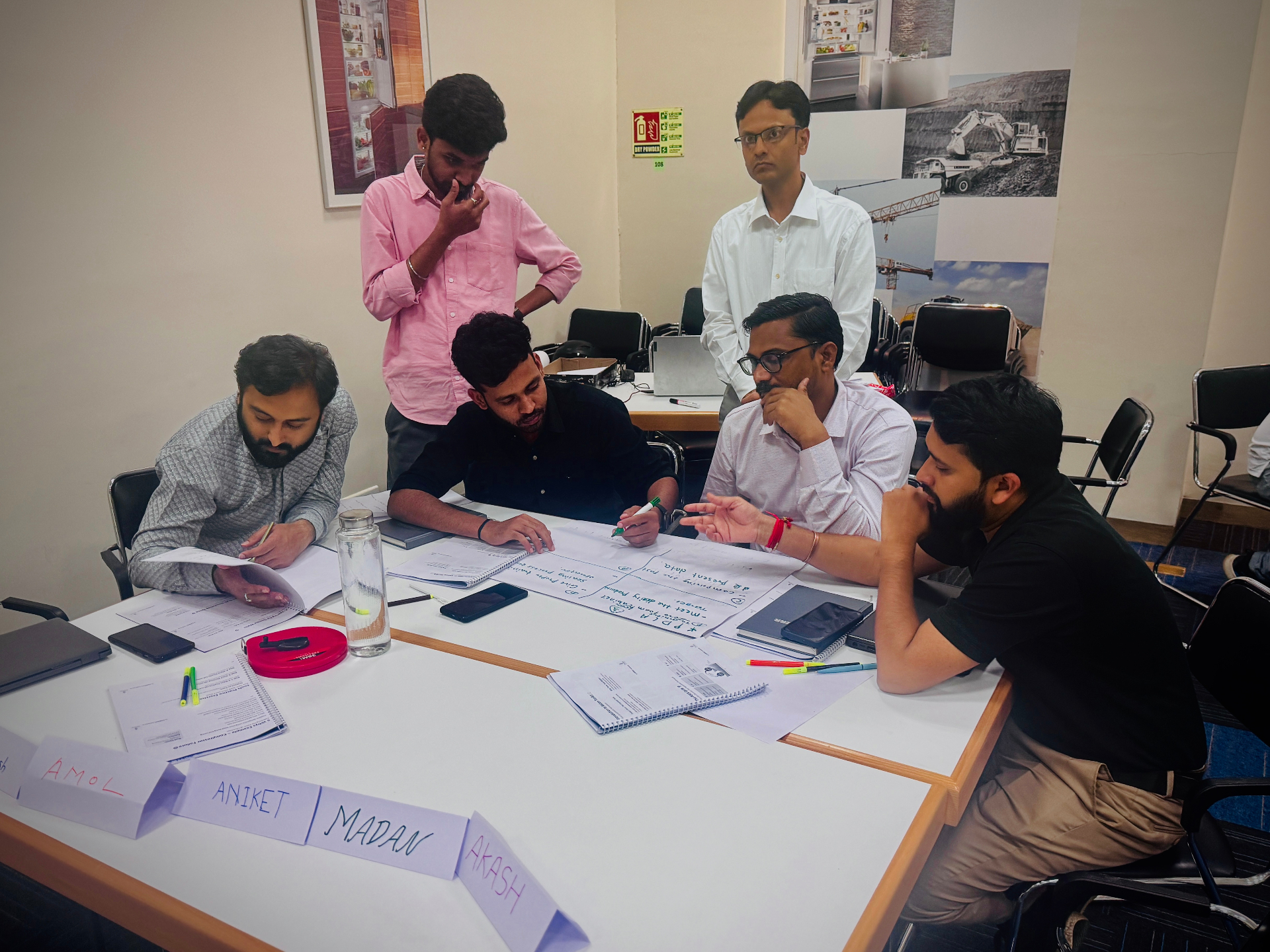 Team collaboration exercise during a SahajOps workshop